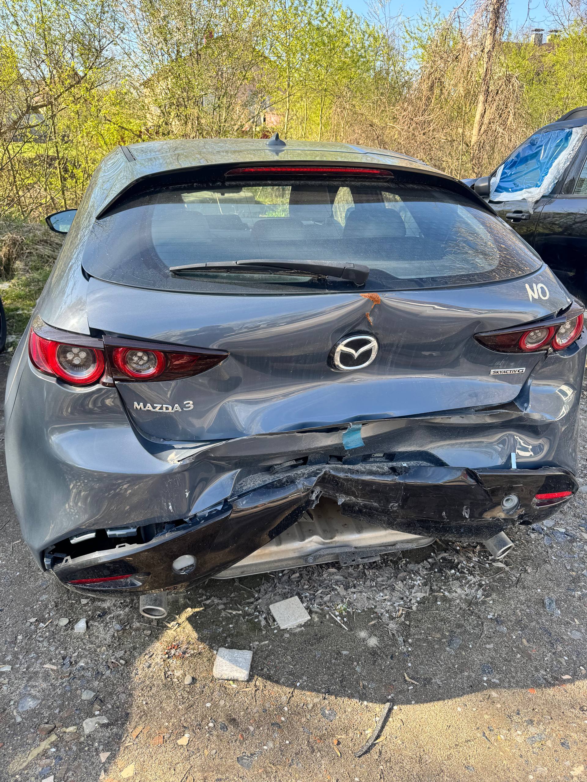 Купити бампер задній Mazda 3 2020 р. 