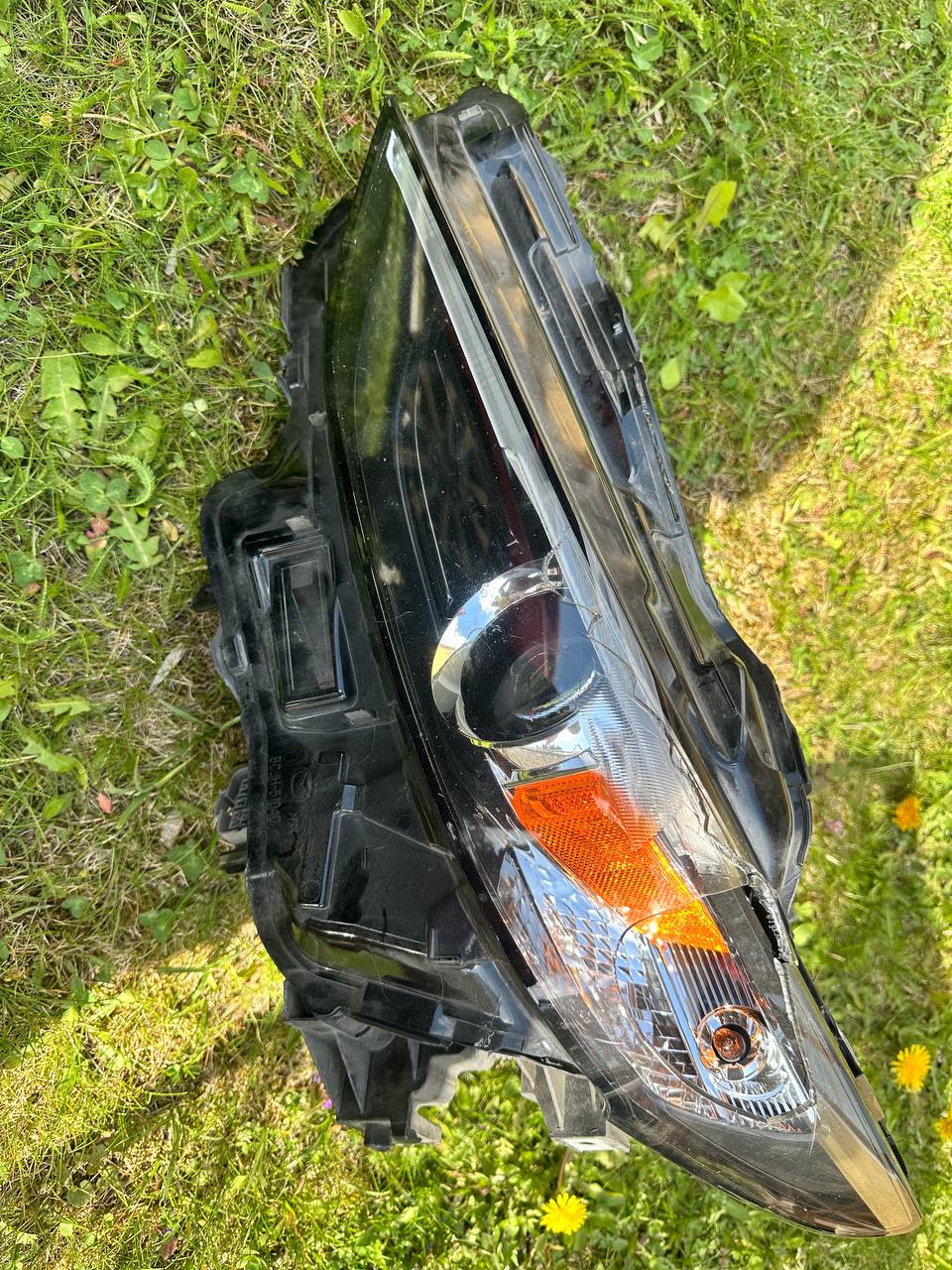 Купити фара Mazda 