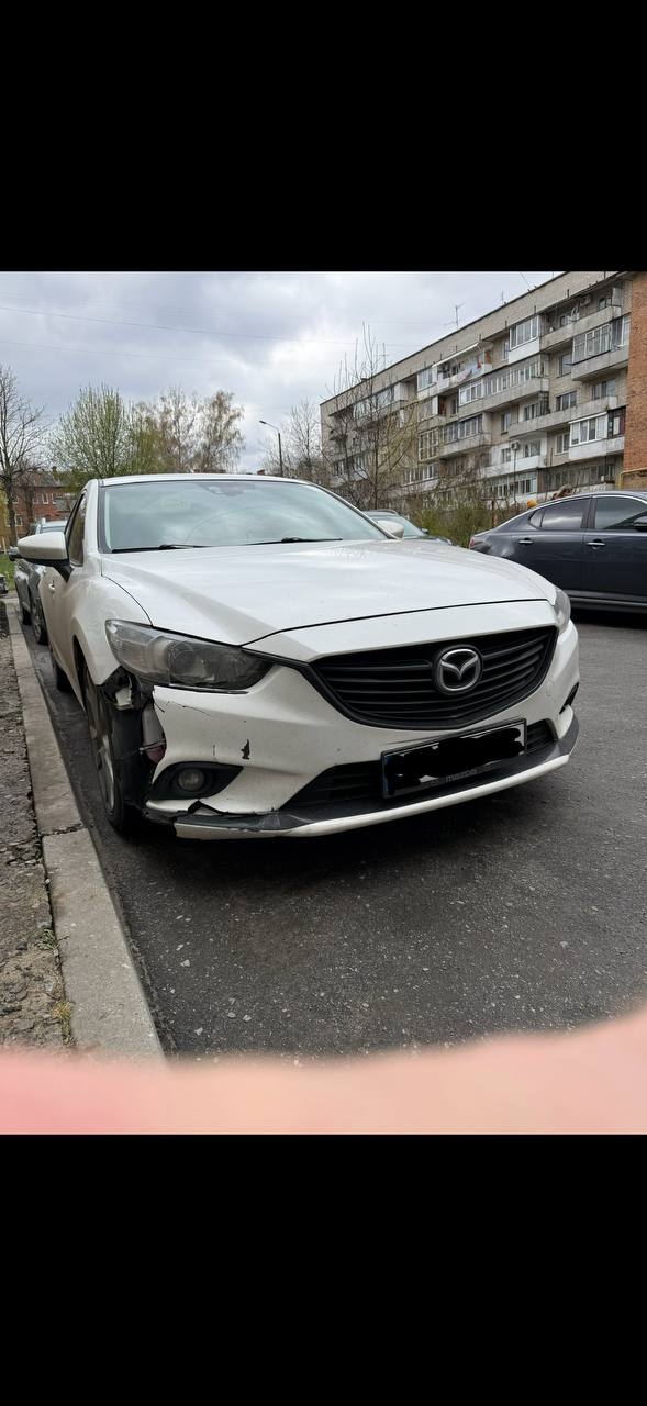 Купити передній бампер Mazda 2013 р. 