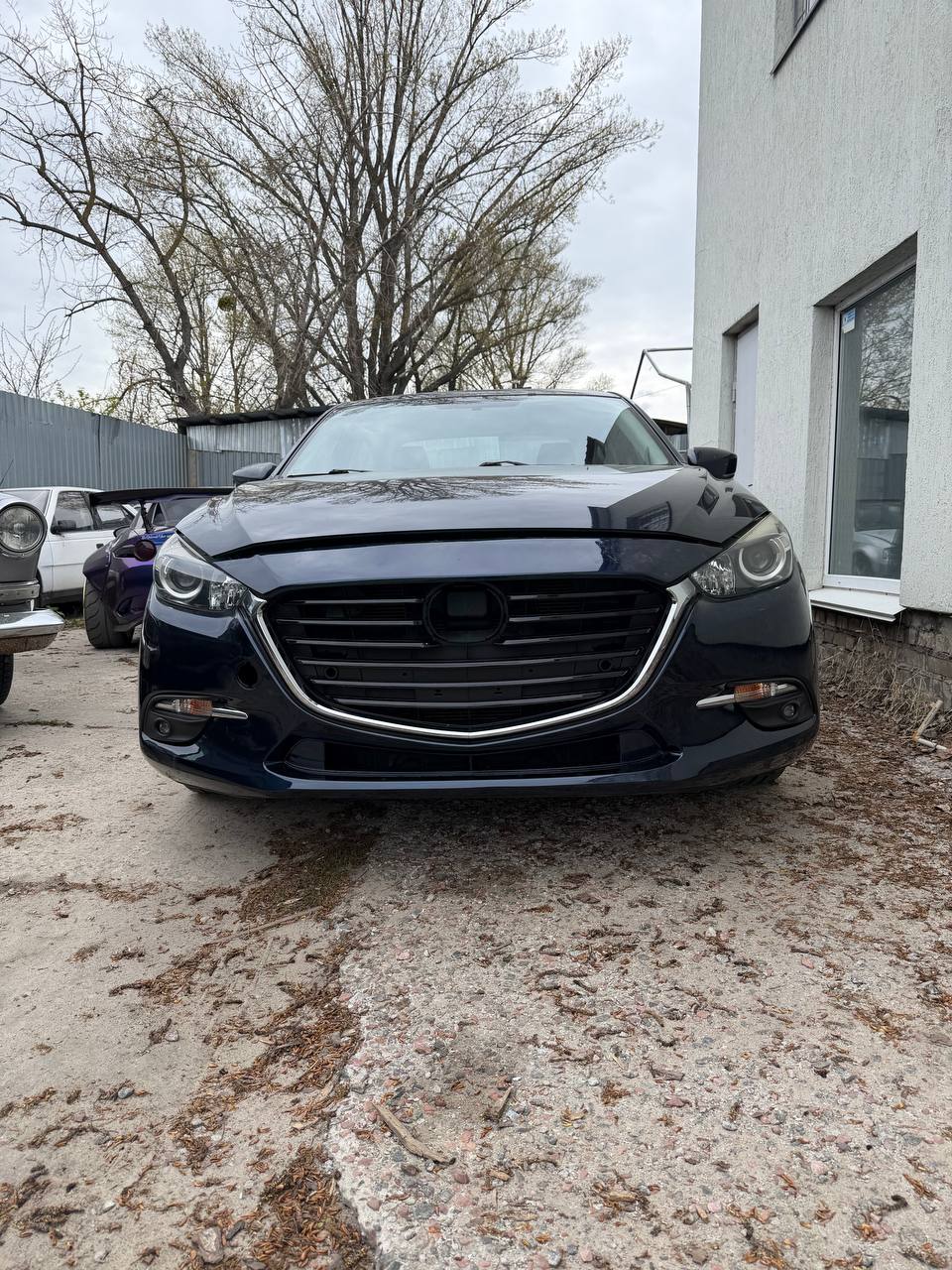 Купити решітка Mazda 3 