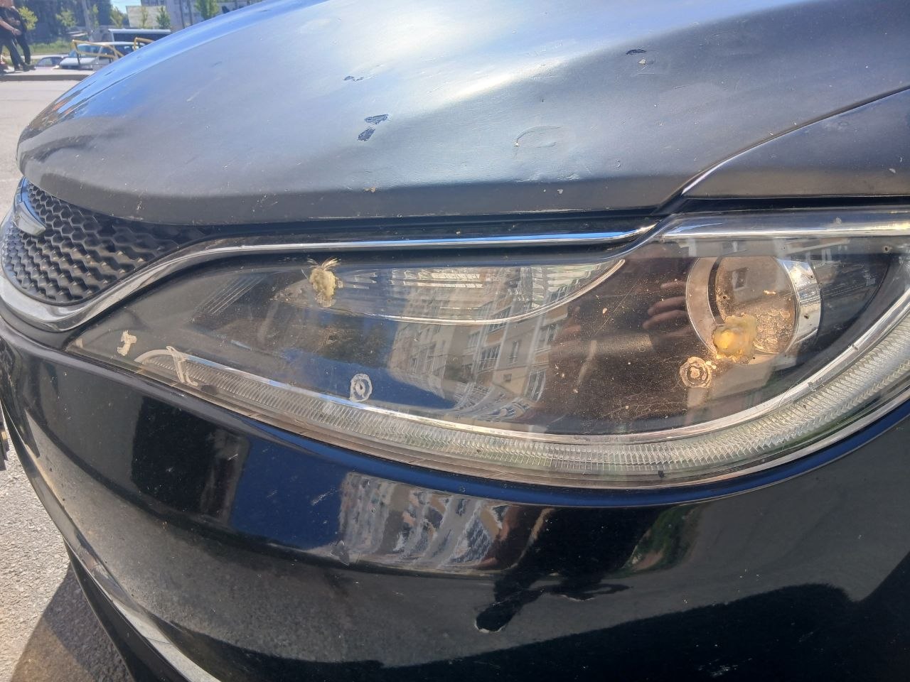 Купити скло фари Chrysler 200 