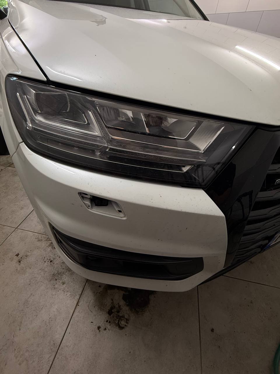 Купити заглушка омивача фар праву Audi null 